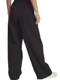 Pantaloni UA Unstoppable Woven Parachute da donna